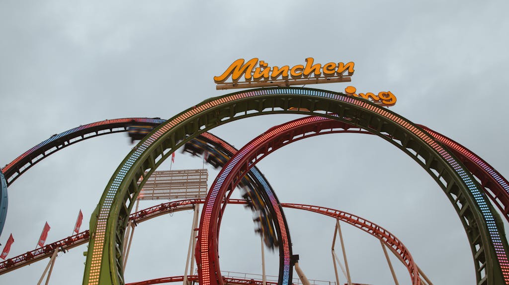 Dynamic view of colorful loops on a roller coaster in Munich.