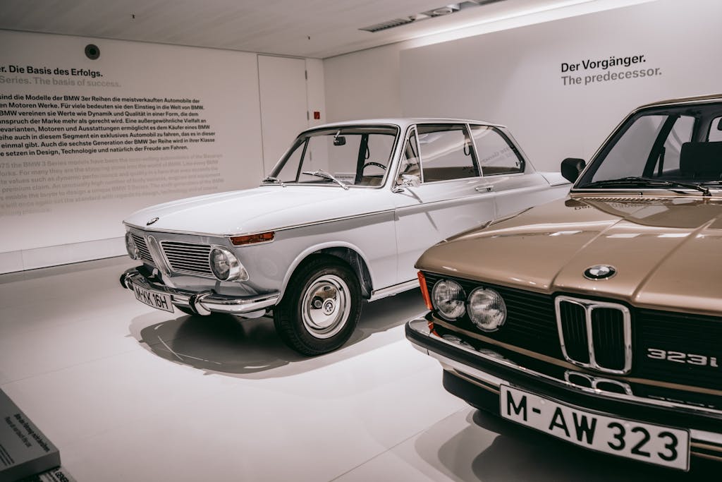 Vintage BMW cars showcased in Munich museum exhibit.